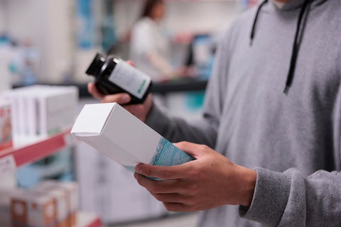man looking for vitamins and supplements to increase sperm count